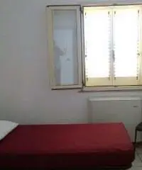 Affittasi camere con bagno