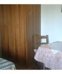 Camere doppie triple angolo cottura