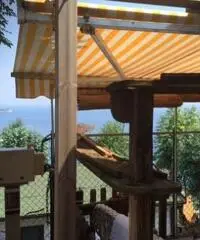 bungalow con annessa roulotte stanziale alassio fronte mare