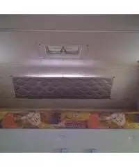 Camper mansardato con portamoto portatutto